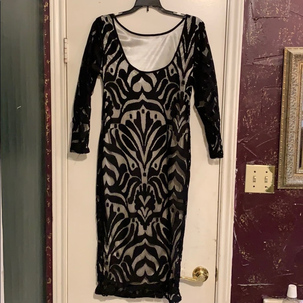 Black lace dress, very unique design. A vintage look.
